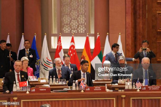 Recep Tayyip Erdoğan President of Turkey, L, British Prime Minister Rishi Sunak, C, and US President Joe Biden listen as Prime Minister Narendra Modi...