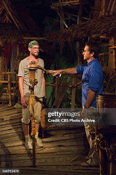 "Cut Off the Head of the Snake" - Michael Snow becomes the next evicted survivor as Jeff Probst extinguishes his torch at Tribal Council during the...