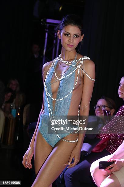 Model presents the 'Divamour' collection while the Launch Party at Tres Honore Bar on April 18, 2013 in Paris, France.