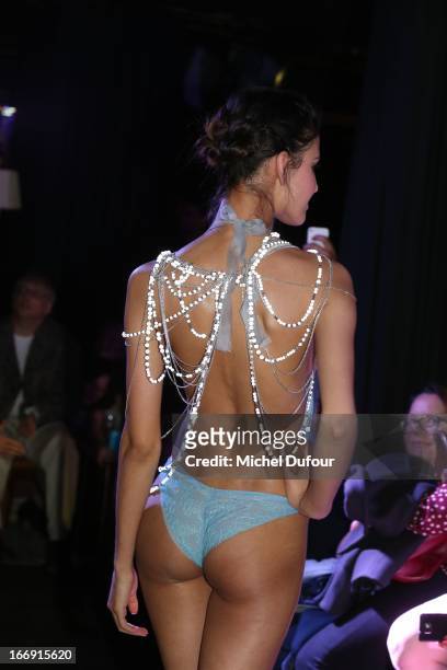 Model presents the 'Divamour' collection while the Launch Party at Tres Honore Bar on April 18, 2013 in Paris, France.