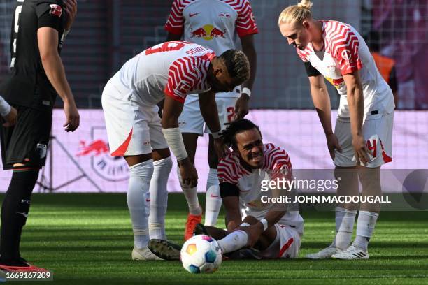 Leipzig's Danish forward Yussuf Poulsen reacts on the pitch during the German first division Bundesliga football match between RB Leipzig and FC...