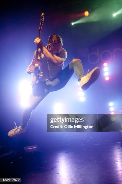 Simon Delaney of Don Broco performs onstage during a sold out show on the last night of the Prioroties 2013 album Tour at KOKO on April 18, 2013 in...