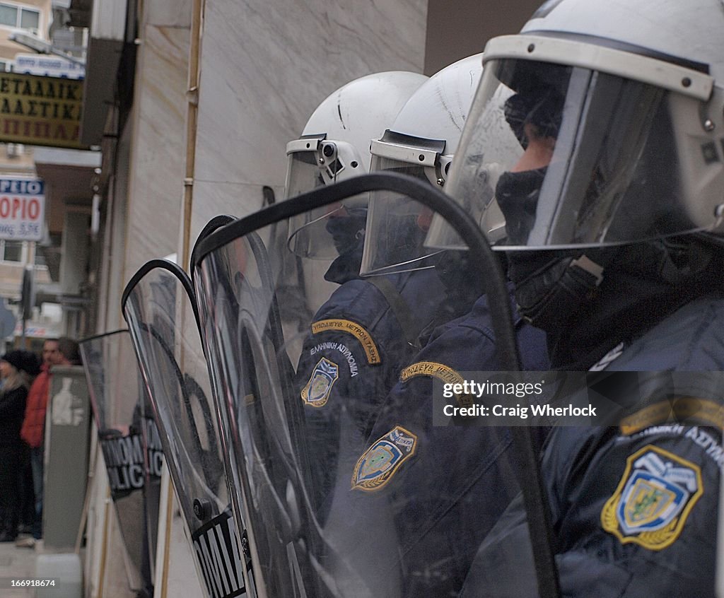 Greek riot police outside finance minister's polit