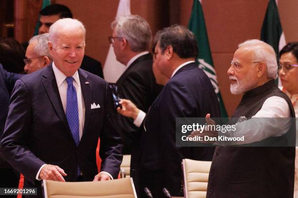 Prime Minister Narendra Modi of India welcomes US President Joe Biden to the opening session during the G20 Leaders' Summit on September 9, 2023 in...