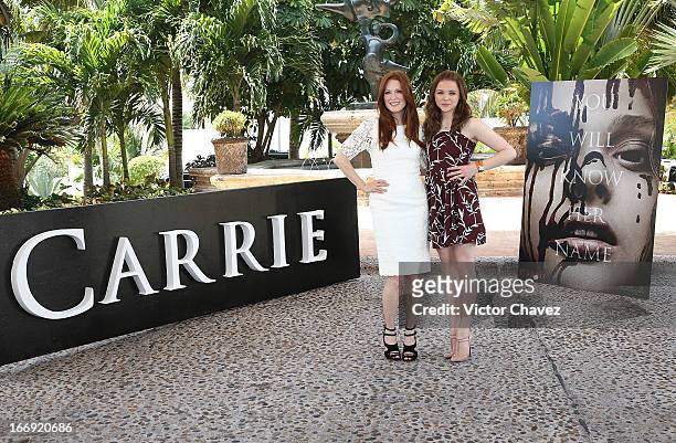 Actresses Julianne Moore and Chloe Grace Moretz attend a photocall to promote the film "Carrie" during the Summer Of Sony 2013 event on April 18,...