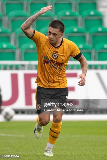 Adam Lewis of Newport County hypes up the supporters after taking the lead during the Sky Bet League Two match between Newport County and Barrow AFC...