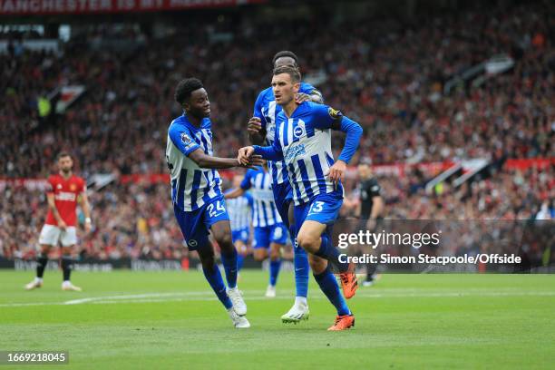 Pascal Gross of Brighton & Hove Albion celebrates with Simon Adingra of Brighton & Hove Albion after scoring their 2nd goal during the Premier League...