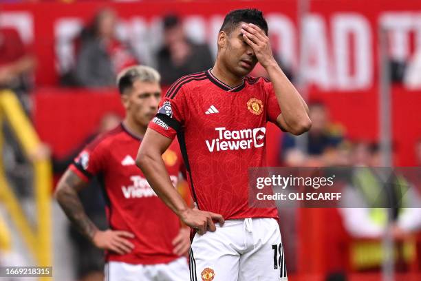 Manchester United's Brazilian midfielder Casemiro reacts to going two goals behind during the English Premier League football match between...