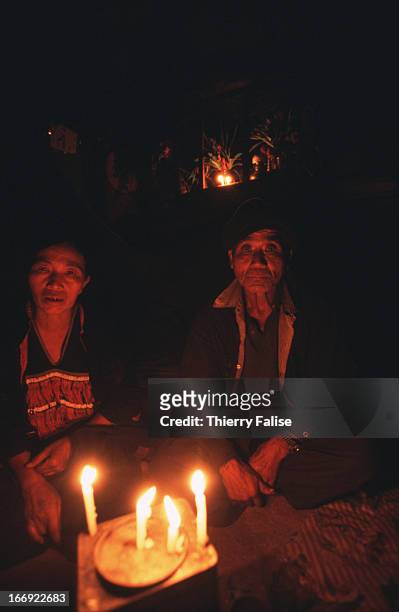 Couple of old ethnic minority people in Jew Kaw village. Like most of this village's men and elders, they are addicted to opium which constitutes the...