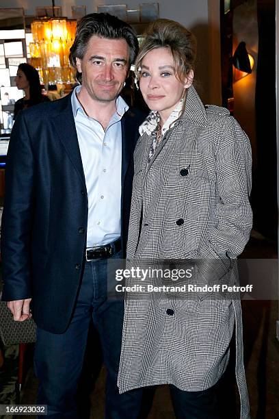 Grace de Capitani and companion Jean-Pierre Jacquin attend 'Divamour' launch party at Tres Honore Bar on April 18, 2013 in Paris, France.