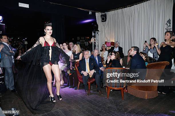 Model walks the runway at the 'Divamour' launch party at Tres Honore Bar on April 18, 2013 in Paris, France.