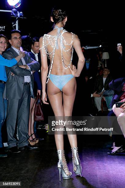 Model walks the runway at the 'Divamour' launch party at Tres Honore Bar on April 18, 2013 in Paris, France.