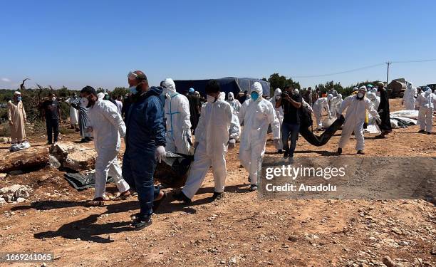 People who lost their lives in floods, are buried in mass graves as the search and rescue operations continue in Derna, Libya on September 16, 2023....