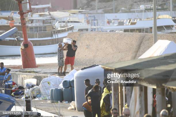 Baby migrant, born during the migrant's crossing, who died soon after the birth take to Favaloro deck in Lampedusa with nearly 70 migrants by the...