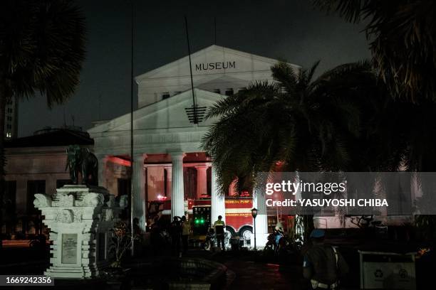 Fire-engine ia seen at the entrance of the National Museum of Indonesia after controlling a fire inside the museum in Jakarta on September 16, 2023.