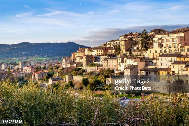 a townscape of the medieval small town of gualdo tadino in the italian region of umbria - gualdo tadino stock pictures, royalty-free photos & images