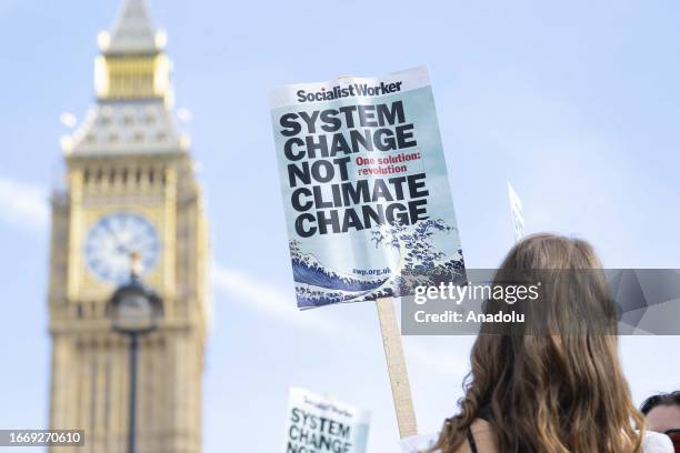 Climate activists stage a demonstration calling for an end to the use of fossil fuels for the 'Climate Summit Week' that will start before the...