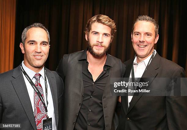 Actor Liam Hemsworth poses with guests prior to the Lionsgate CinemaCon Press Conference Invitational : An Exclusive Product Presentation...