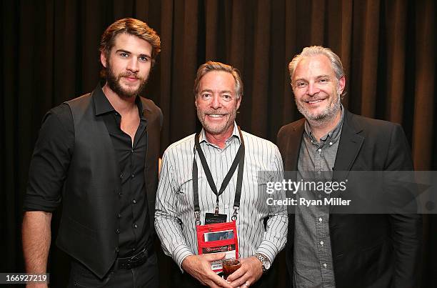 Actor Liam Hemsworth and director Francis Lawrence pose with guests prior to the Lionsgate CinemaCon Press Conference Invitational : An Exclusive...