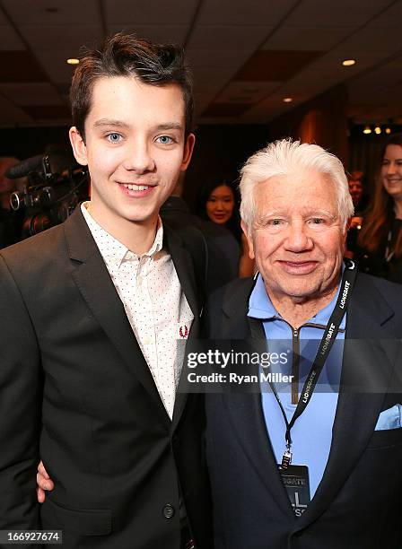 Actor Asa Butterfield poses with guests prior to the Lionsgate CinemaCon Press Conference Invitational : An Exclusive Product Presentation...
