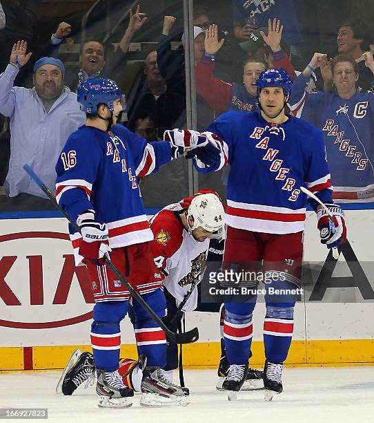 Derick Brassard of the New York Rangers celebrates his second goal of the game against the Florida Panthers along with Ryane Clowe at 16:35 of the...