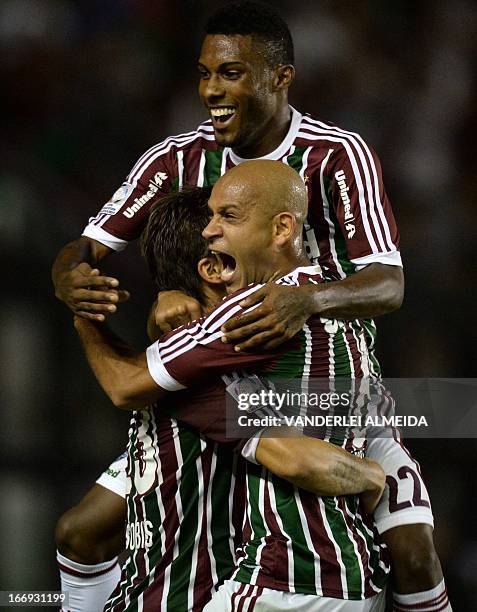 Rafael Sobis , Carlinhos and Rayner of Brazil’s Fluminense, celebrate their goal scored against Venezuela’s Caracas FC, during their 2013 Copa...