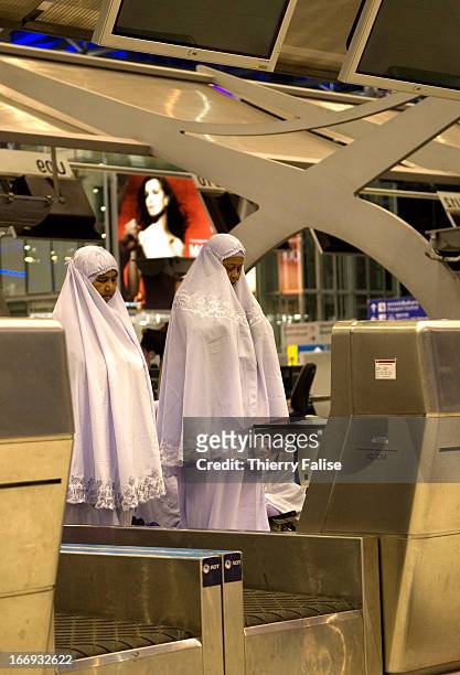 Thai Muslim pilgrims on their way to the Mecca are stranded at the Suvarnabhumi international airport in Bangkok after thousands of followers of the...