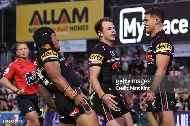 Nathan Cleary of the Panthers celebrates with team mates after scoring a try during the NRL Qualifying Final match between Penrith Panthers and New...