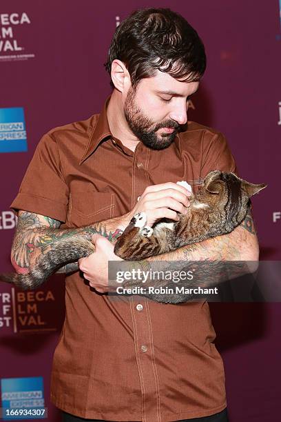 Lil Bubs owner Mike Bridavsky and celebrity internet cat Lil Bub attend the "Lil Bub & Friendz" world premiere during the 2013 Tribeca Film Festival...