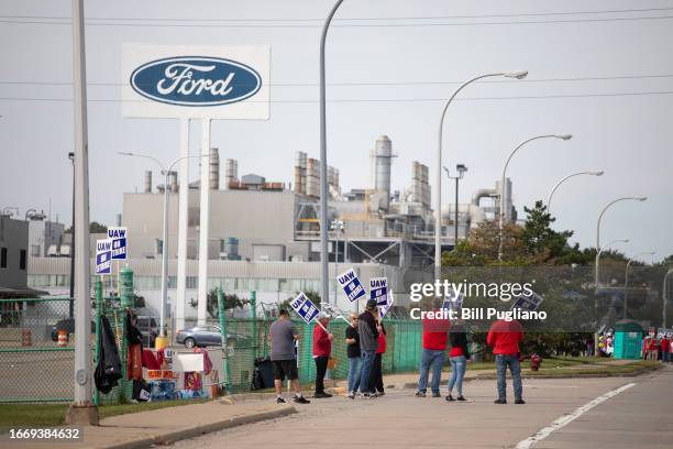 United Auto Workers members strike at the Ford Michigan Assembly Plant on September 16, 2023 in Wayne, Michigan. This is the first time in history...