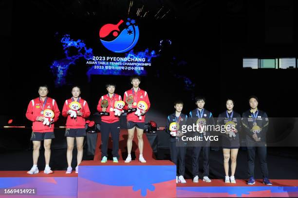 Silver medalists Liang Jingkun and Qian Tianyi of China, gold medalists Lin Gaoyuan and Wang Yidi of China, bronze medalists Chen Szu-yu and Lin...