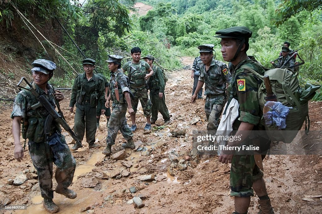 Soldiers from the Kachin Independence Army (KIA) come back...