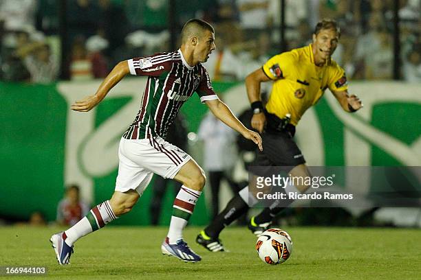 Wagner of Fluminense fights for the ball during the match between Fluminense and Caracas as part of Copa Bridgestone Libertadores 2013 at São...