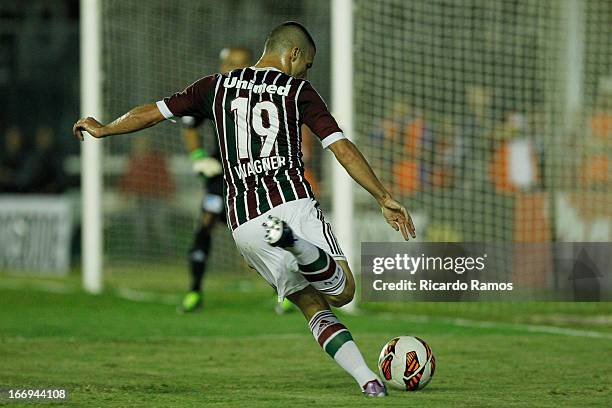 Wagner of Fluminense fights for the ball during the match between Fluminense and Caracas as part of Copa Bridgestone Libertadores 2013 at São...