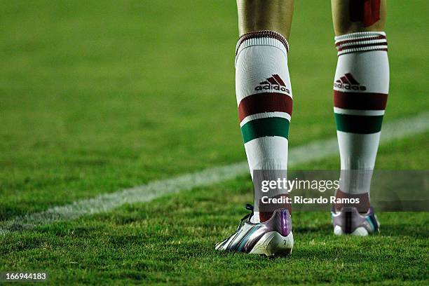 Detail of the boots of a player of Fluminense during the match between Fluminense and Caracas as part of Copa Bridgestone Libertadores 2013 at São...