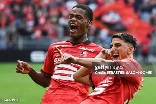 Rennes' Moroccan forward Ibrahim Salah celebrates with Rennes' French midfielder Warmed Omari after scoring a goal during the French L1 football...