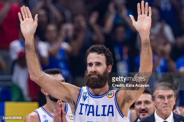 Luigi Datome of Italy waves to the crowd after officially retiring from basketball during the FIBA Basketball World Cup Classification 7-8 game...