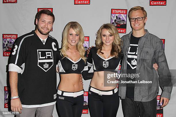 Guests pose with The LA Kings Ice Crew at the LA Kings Chalk Talk & Game Experience at Staples Center on April 18, 2013 in Los Angeles, California.