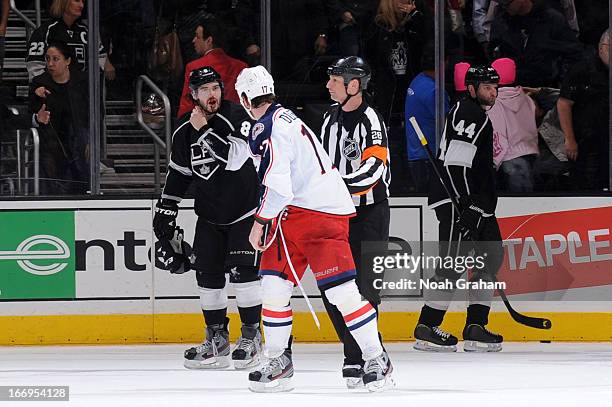 Drew Doughty of the Los Angeles Kings is separated from Brandon Dubinsky of the Columbus Blue Jackets after getting into a fight after the game at...