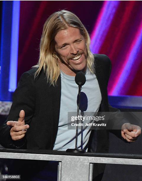 Musician Taylor Hawkins onstage at the 28th Annual Rock and Roll Hall of Fame Induction Ceremony at Nokia Theatre L.A. Live on April 18, 2013 in Los...