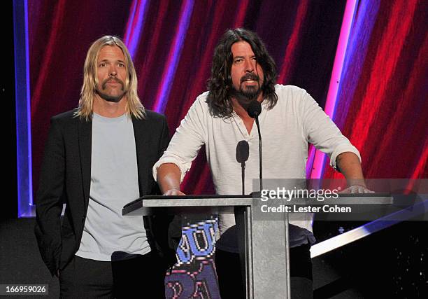 Taylor Hawkins and Dave Grohl onstage during the 28th Annual Rock and Roll Hall of Fame Induction Ceremony at Nokia Theatre L.A. Live on April 18,...