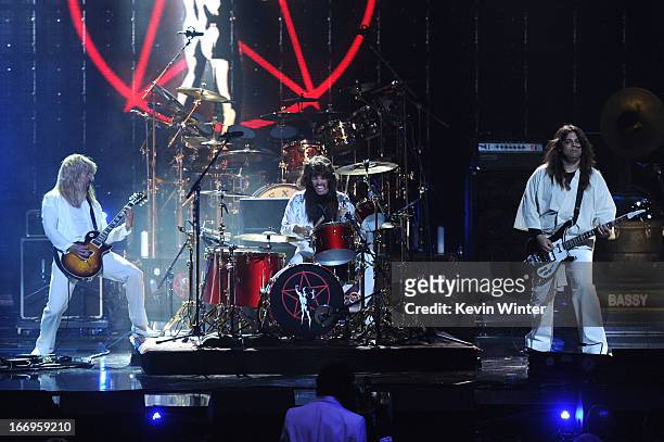 Musicians Dave Grohl and Taylor Hawkins of Foo Fighters and producer Nick Raskulinecz perform onstage at the 28th Annual Rock and Roll Hall of Fame...