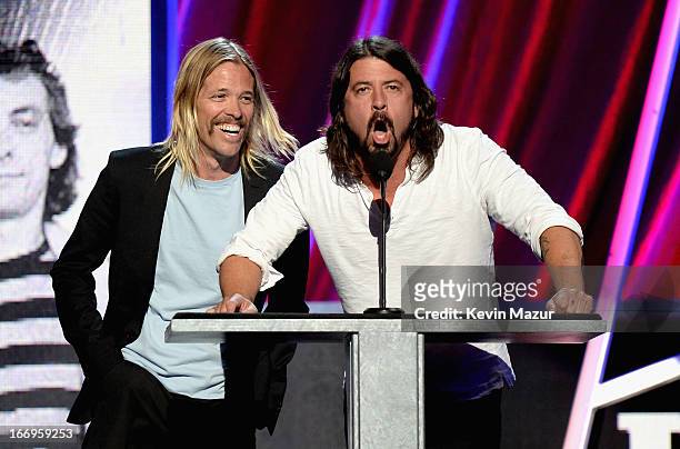 Musicians Taylor Hawkins and Dave Grohl perform onstage during the 28th Annual Rock and Roll Hall of Fame Induction Ceremony at Nokia Theatre L.A....