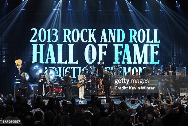Inductees Ann Wilson and Nancy Wilson of Heart and Alex Lifeson of Rush, musicians Taylor Hawkins and Dave Grohl of Foo Fighters, inductees Neil...