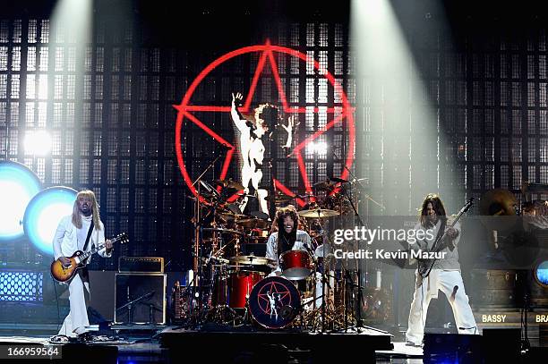 Musicians Dave Grohl, Taylor Hawkins and Nick Raskulinecz peform onstage during the 28th Annual Rock and Roll Hall of Fame Induction Ceremony at...