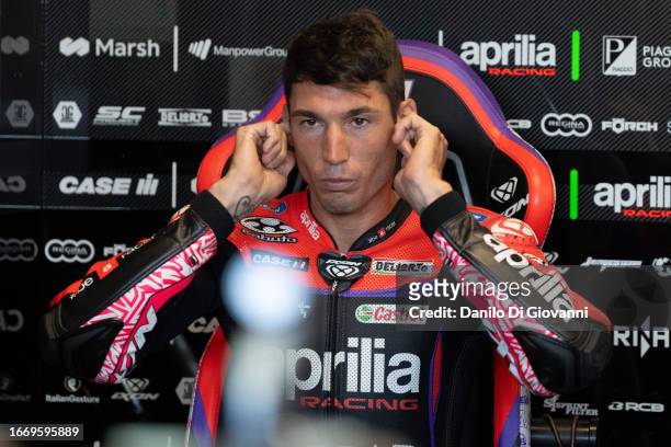 Aleix Espargaro of Spain and Aprilia Racing look on at box during qualify of the MotoGP Of San Marino at Misano World Circuit on September 09, 2023...