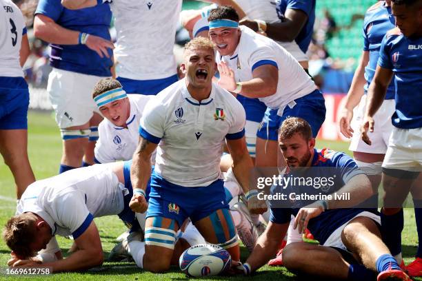 Lorenzo Cannone of Italy celebrates scoring his team's first try during the Rugby World Cup France 2023 match between Italy and Namibia at Stade...