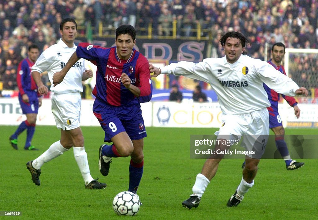  Julio Cruz of Bologna and Omar Milanetto of Modena in action...