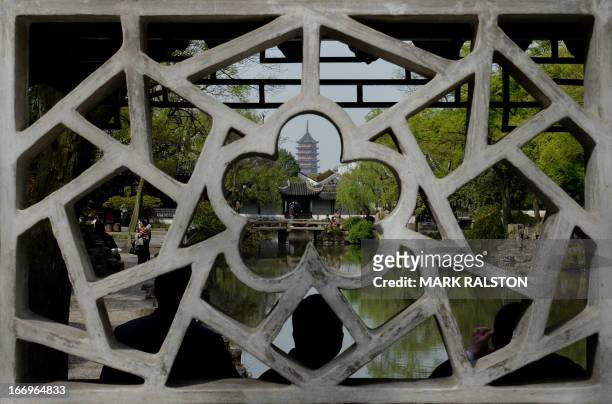 This photo taken on April 10, 2013 shows a pagoda at the Humble Administrator's Garden in the city of Suzhou. Suzhou which has a history of over...