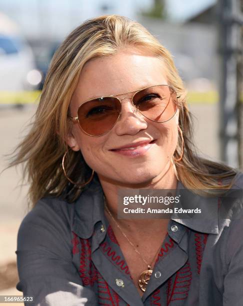 Actress Amy Smart celebrates Earth Day with the Environmental Media Association at Cochran Middle School on April 18, 2013 in Los Angeles, California.